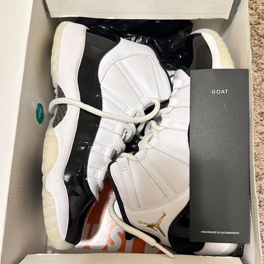 Air Jordan 11 Retro White and Black Sneakers
